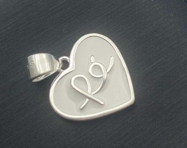 Dijes de plata - Image 2